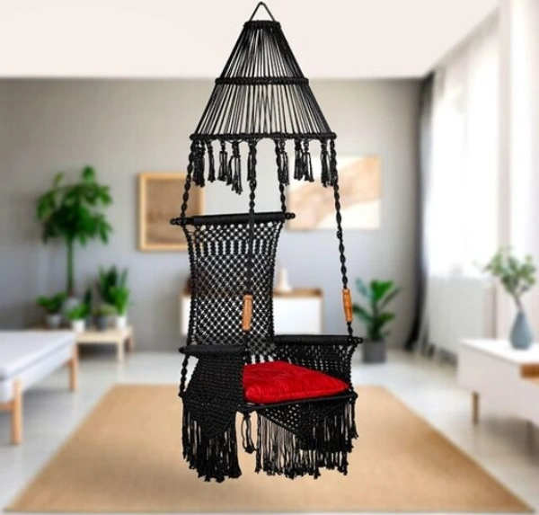 The Elegant Curio Centre Premium Maharaja Hanging Swing -Black with Polyester Ropes & Mild Steel Frame Chair with Heavy Duty Stainless Steel Hanging Accessories And Cushion has a unique design, -  Free Size,  Black,  Polyester Rope With Iron Frame,  Pack of 1